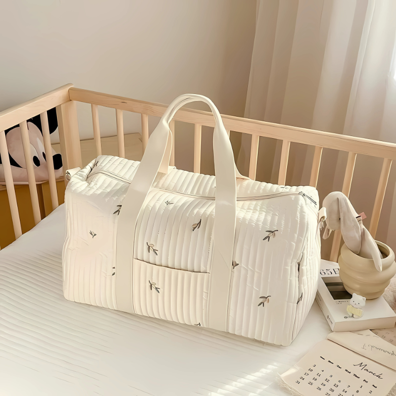 Unisex quilted diaper bag, spacious for parents on-the-go with baby essentials