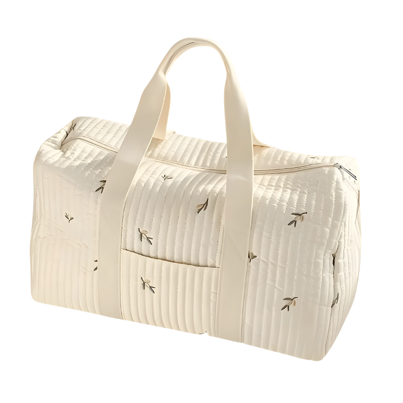 Versatile quilted diaper bag with multiple pockets for organized baby care