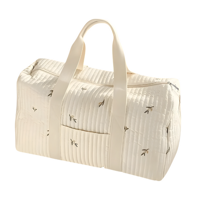 Versatile quilted diaper bag with multiple pockets for organized baby care