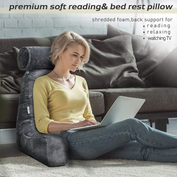 Unisex arm bed pillow for reading, providing plush back and neck support, perfect for cozy lounging & home comfort.