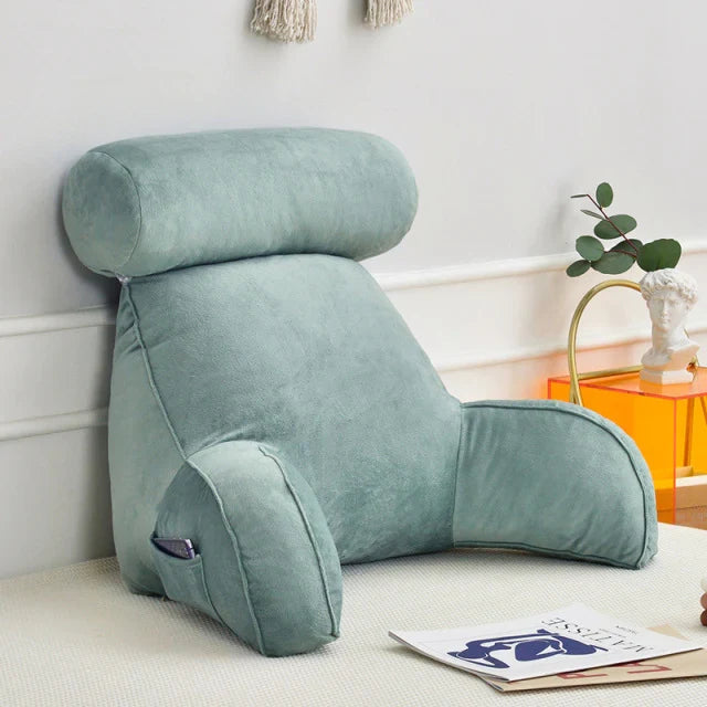 Stylish reading bed pillow with arms, a soft memory foam addition for home decor, perfect for comfortable lounging.