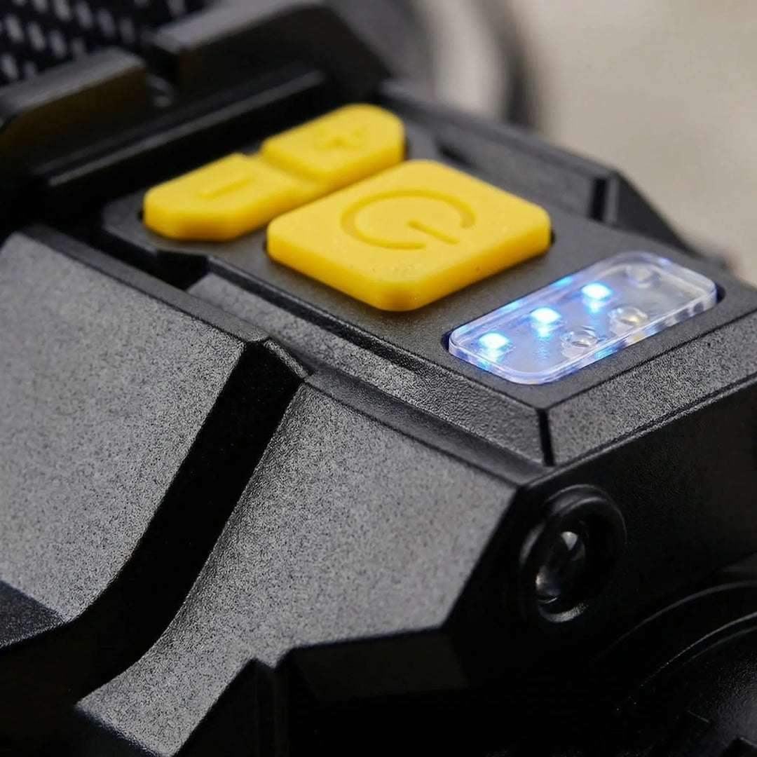Portable, unisex rechargeable COB LED headlamp. Ideal hands-free light for camping, running, and outdoor gear.