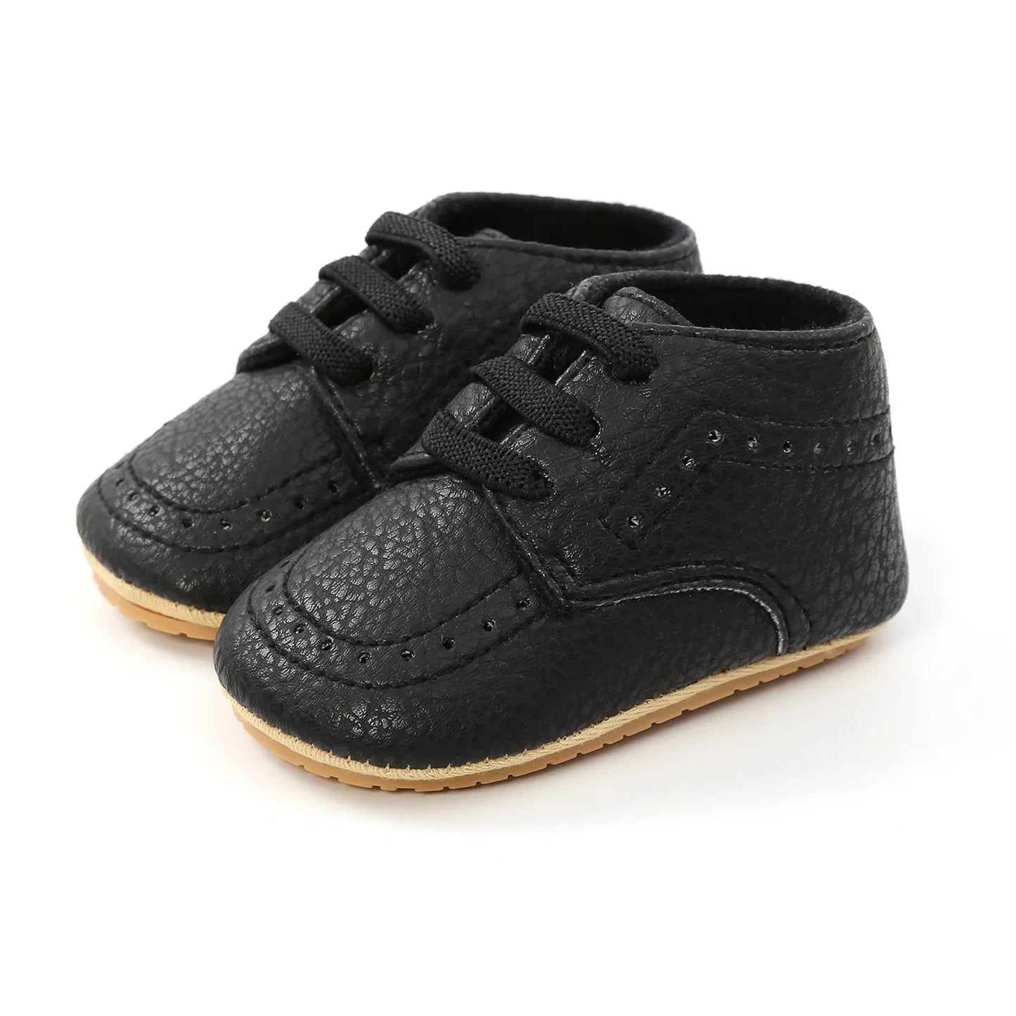 Close-up of retro leather detail on baby moccasins, quality craftsmanship
