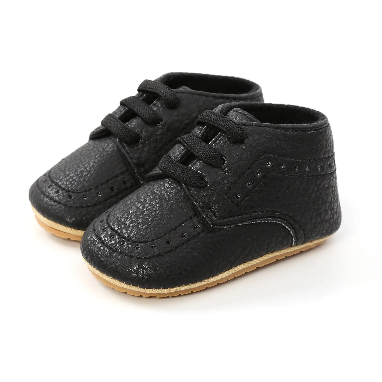 Close-up of retro leather detail on baby moccasins, quality craftsmanship