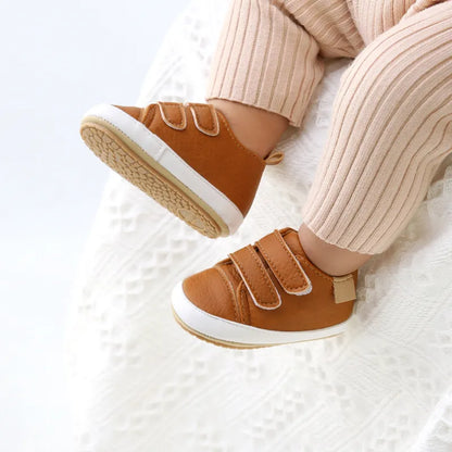 Unisex retro tan leather baby moccasins with soft sole, anti-slip design