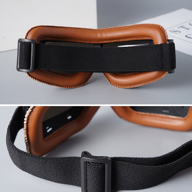 Retro black motorcycle goggles, clear shatterproof lenses for robust eye protection outdoors.