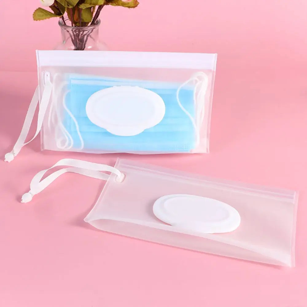 On-the-go baby wipes holder with an integrated snap strap for secure carrying