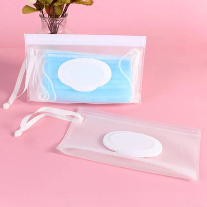 On-the-go baby wipes holder with an integrated snap strap for secure carrying