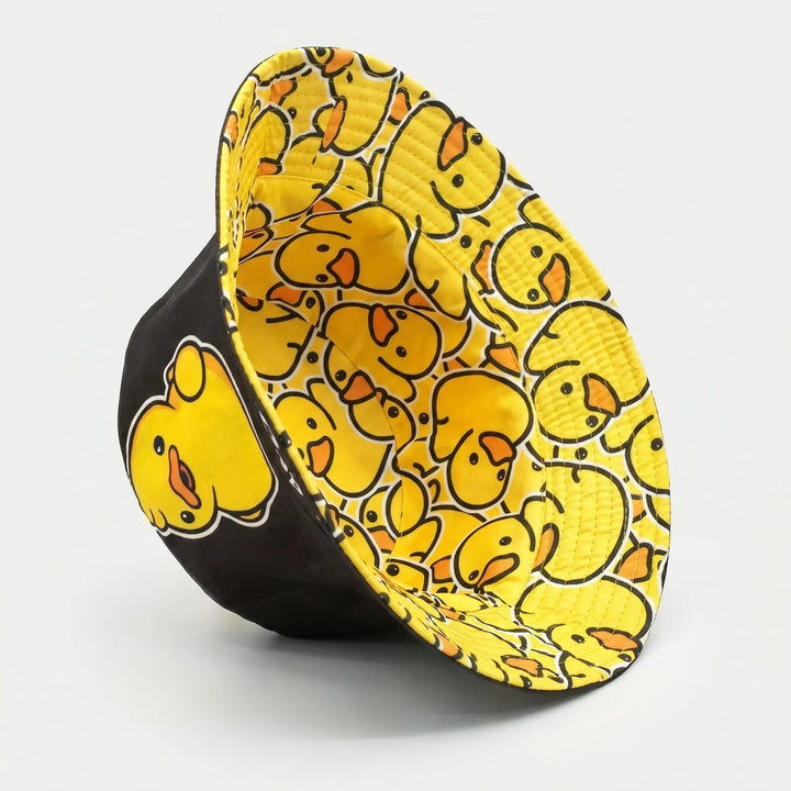 Versatile patterned cartoon bird bucket hat. Unisex & reversible design, ideal for summer outfits & travel.