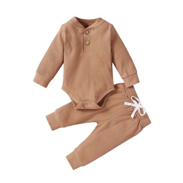 Full view of unisex ribbed cotton long sleeve romper & pants set, shown flat