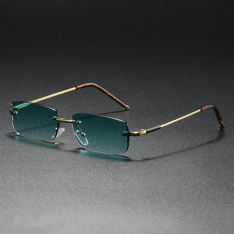 Unisex rimless rectangular sunglasses with chic gold gradient lenses, offering modern style & UV protection.