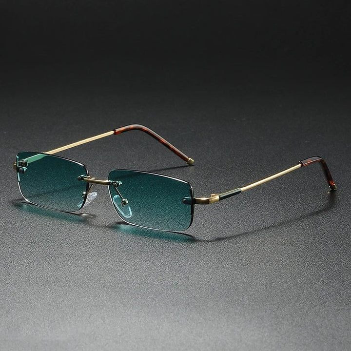 Unisex rimless rectangular sunglasses with chic gold gradient lenses, offering modern style & UV protection.