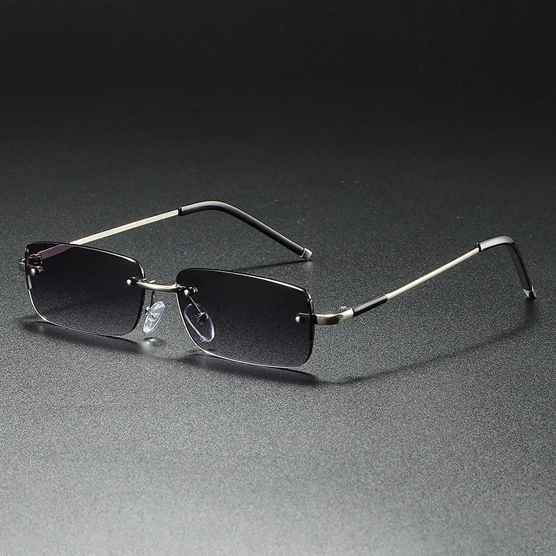 Modern rimless rectangular sunglasses featuring stylish gold gradient lenses for a chic, lightweight fashion statement.