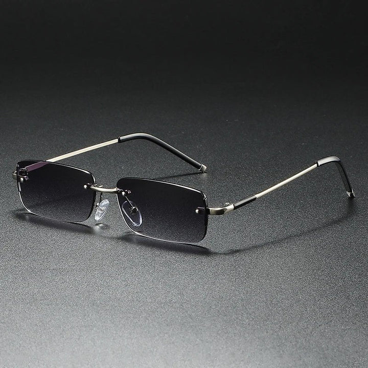 Modern rimless rectangular sunglasses featuring stylish gold gradient lenses for a chic, lightweight fashion statement.