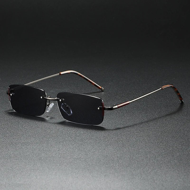 Sleek unisex rectangular sunglasses with rimless design & striking gold gradient lenses, perfect for any outfit.