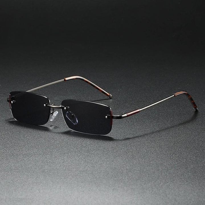 Sleek unisex rectangular sunglasses with rimless design & striking gold gradient lenses, perfect for any outfit.