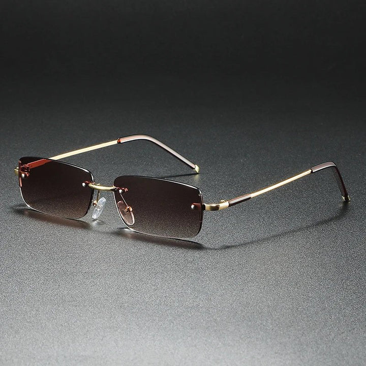 Lightweight unisex rimless sunglasses with gold gradient tint & rectangular frames, providing essential UV protection.