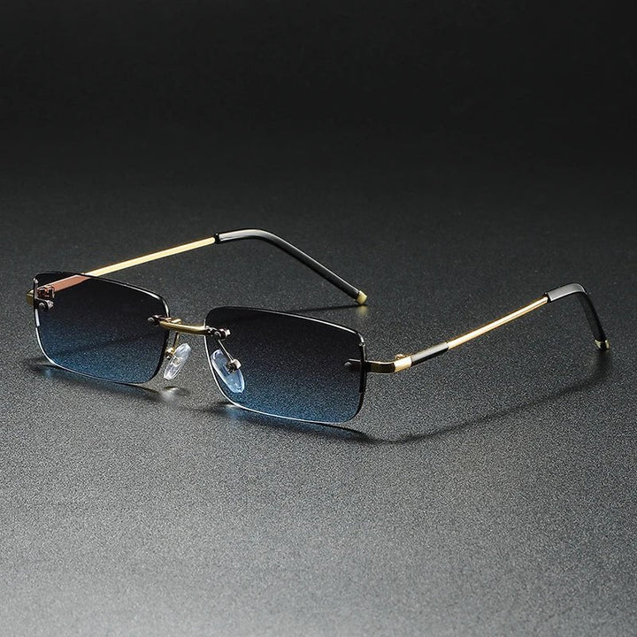 Fashion-forward rimless rectangular sunglasses for men & women, featuring luxurious gold gradient lenses & UV protection.