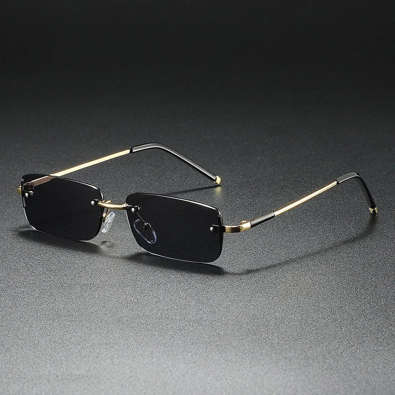 Stylish unisex rimless rectangular sunglasses featuring luxurious gold gradient lenses, offering UV protection & chic modern style.