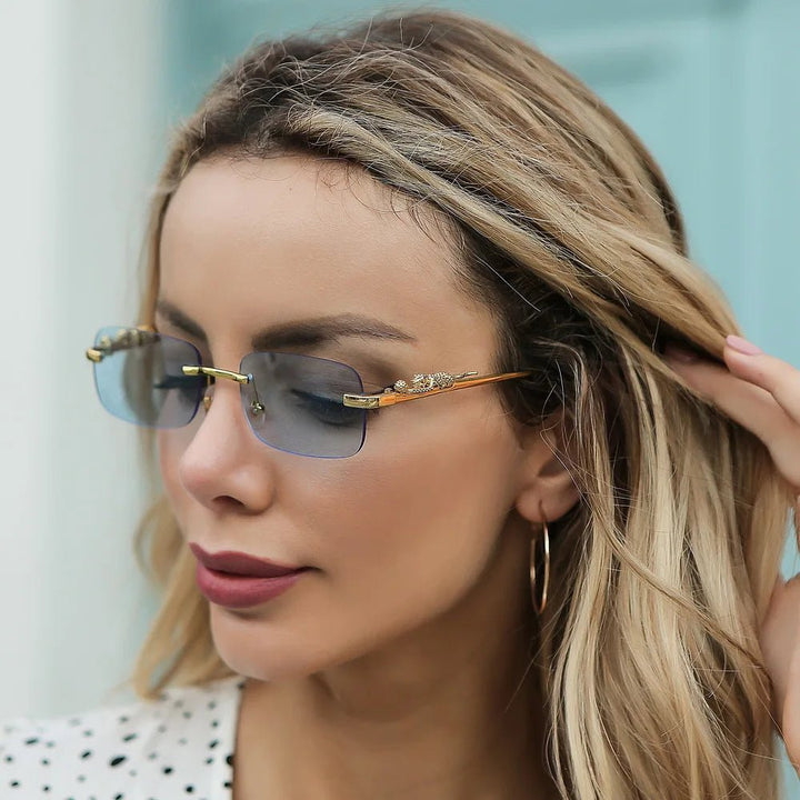 Chic unisex rimless leopard head sunglasses with anti-reflective & UV400 lenses.