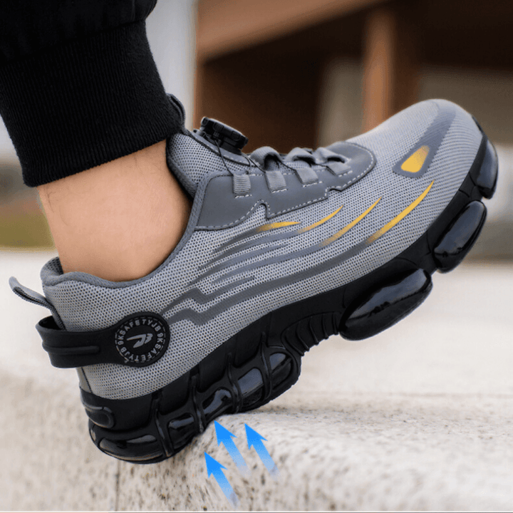 Unisex safety work shoes, black, with red accents, offering all-day comfort, support, & protection for industrial work.