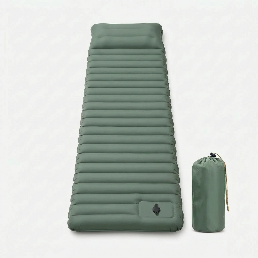 Inflated 4-inch self-inflating camping pad in a tent, offering comfortable sleep for outdoor enthusiasts.