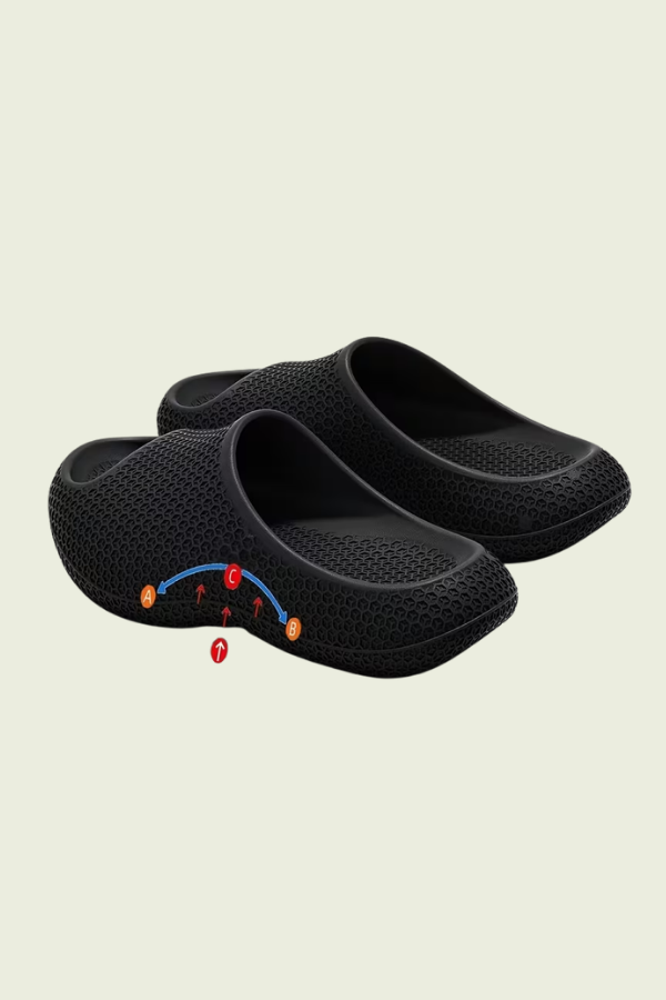 All-day comfort unisex slip-on slippers, featuring essential arch support and a cushioned sole.
