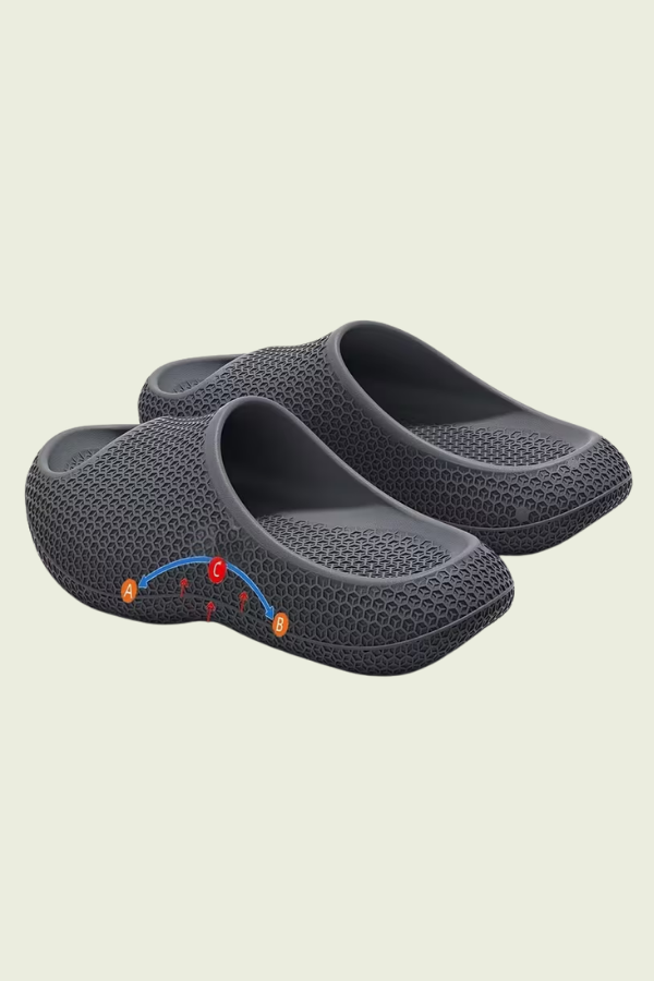 Casual slip-on footwear with advanced arch support, designed for unisex all-day indoor comfort.
