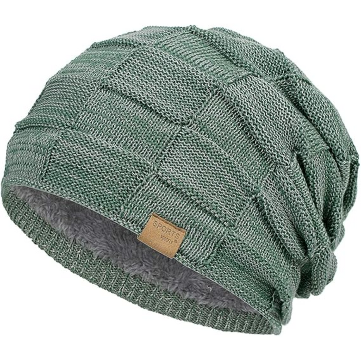 Relaxed fit unisex slouchy beanie, a warm knit cap for casual winter comfort and style.