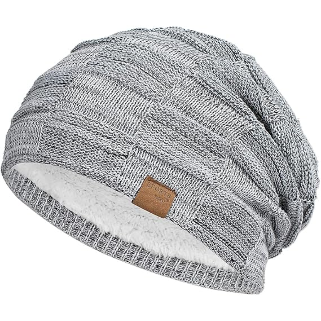 Slouchy knit winter beanie for unisex. Warm and cozy headwear for cold weather outdoor activity.