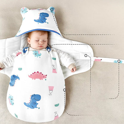 Newborn baby wrapped snugly in a white SnuggleBear cotton swaddle, promoting sound sleep