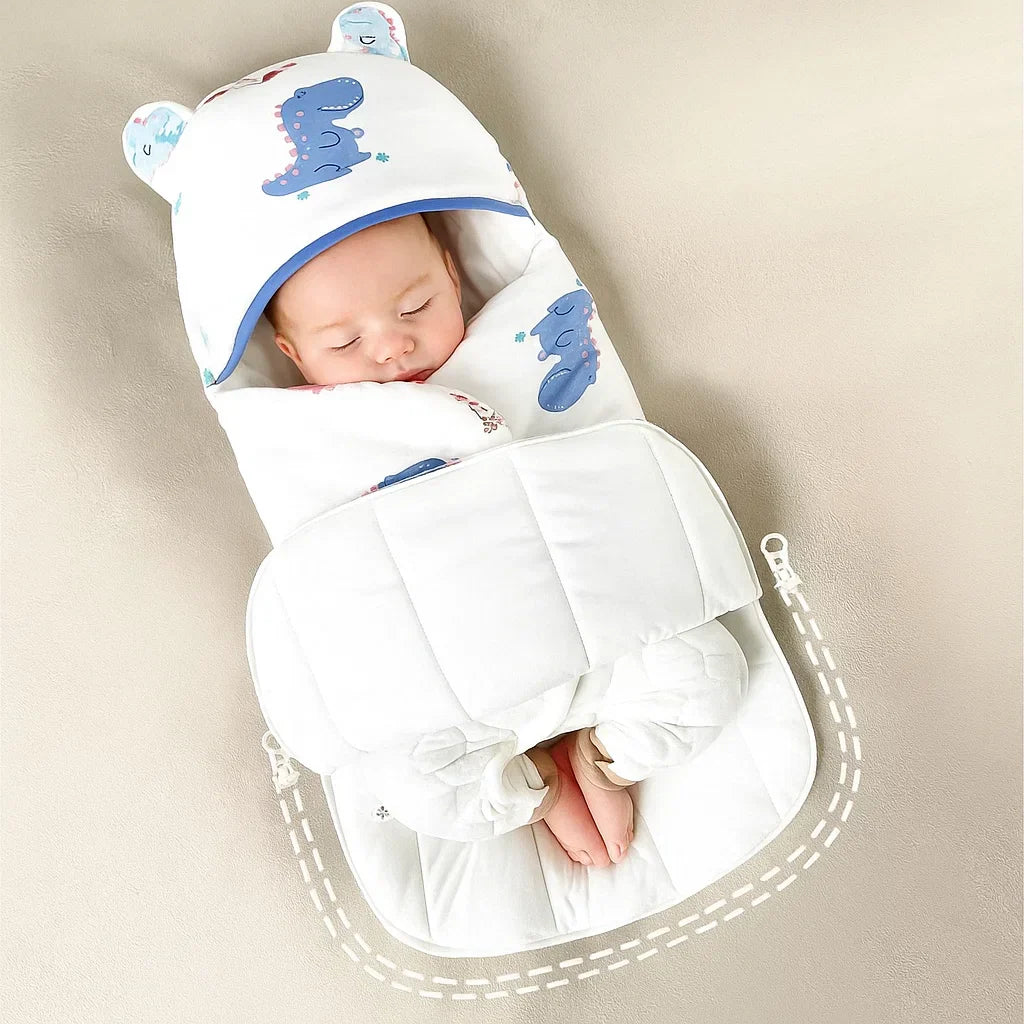 SnuggleBear cotton baby swaddle blanket spread out, featuring gentle fabric for infant comfort