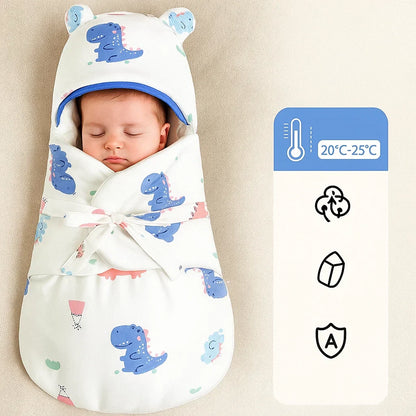 Adorable baby in a SnuggleBear unisex cotton swaddle, looking cozy and content for sleep