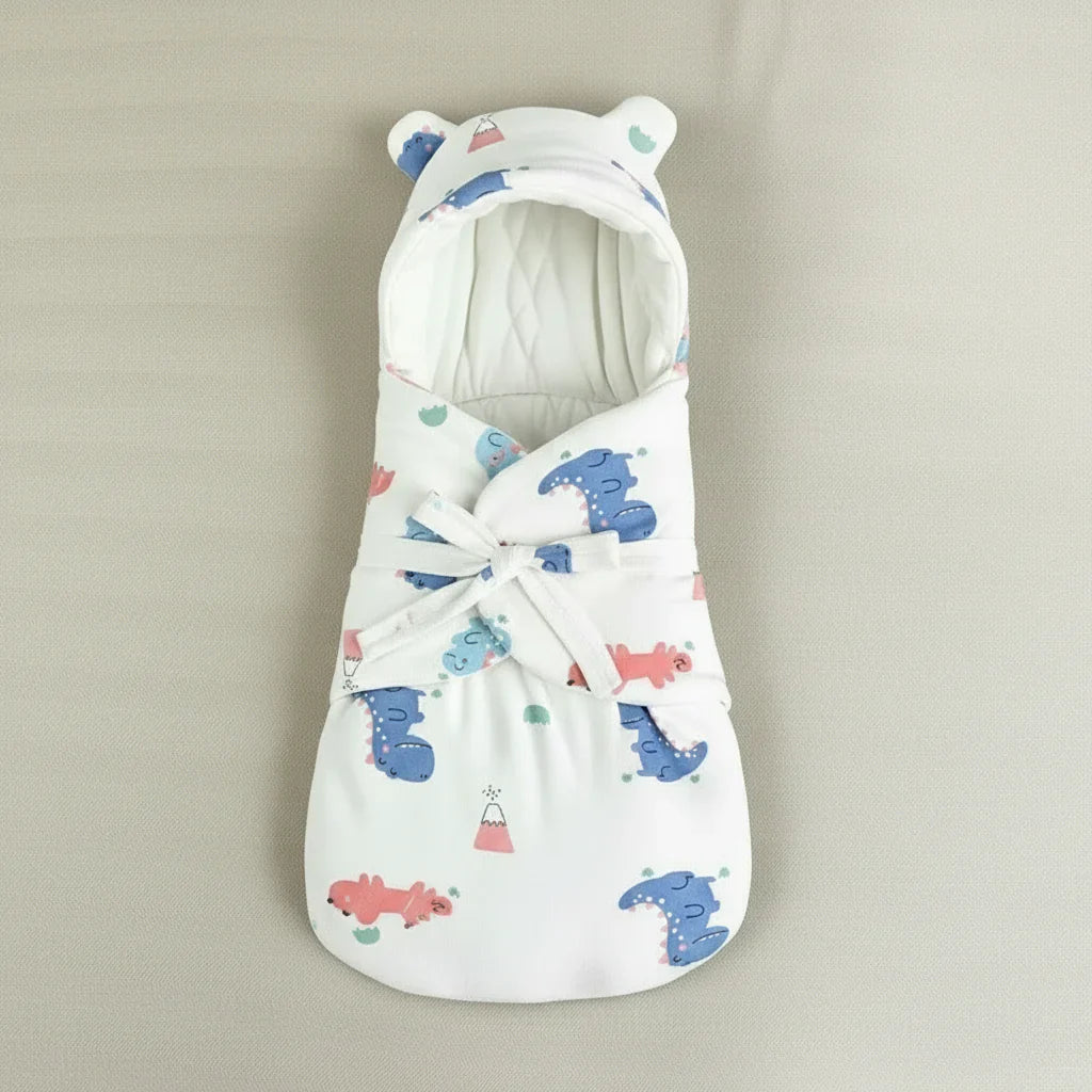 Parents gently wrapping their newborn in a SnuggleBear cotton swaddle blanket for comfort and sleep