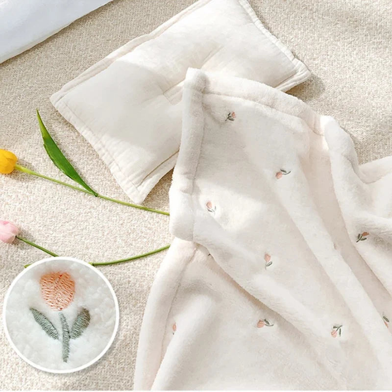 White soft fleece baby blanket, versatile & gentle, keeps newborns & toddlers warm.