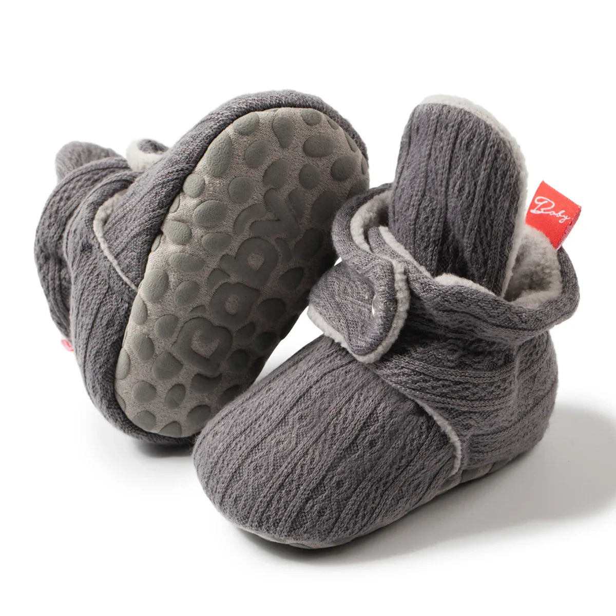 Soft fluff cotton baby booties, unisex, hook and loop closure, anti-slip sole, cozy for infants.