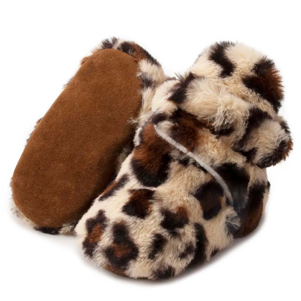 Unisex baby booties, soft fluff texture, ideal for infant first walkers, warm cotton material.