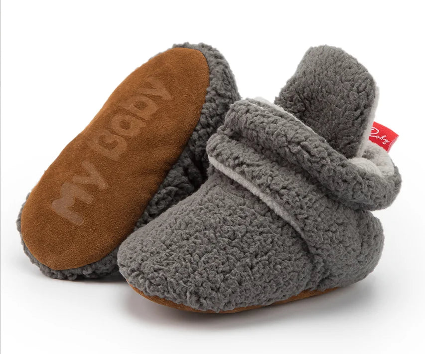 Unisex baby booties, soft fluff, hook and loop fastening, anti-slip, cozy infant first walkers.