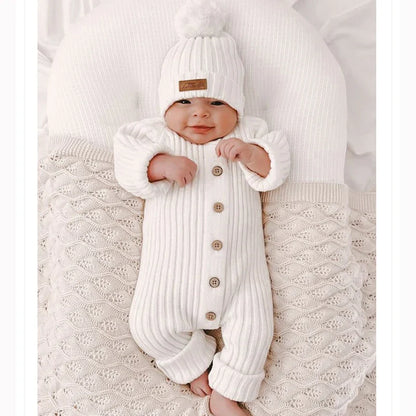 Full shot of a gender-neutral knitted cotton baby romper, ideal for all-season infant apparel