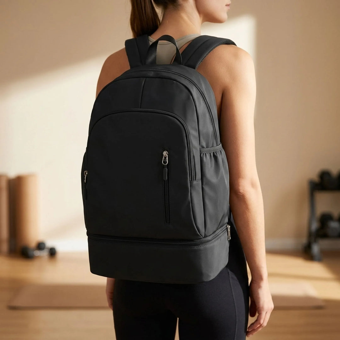 Unisex sports backpack with shoe compartment, ideal for gym, travel, or work commute. Durable nylon material.