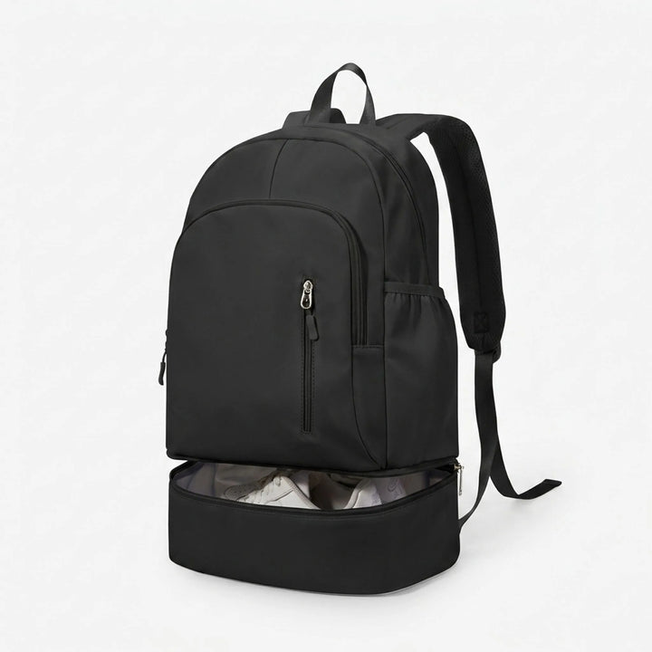 Nylon sports backpack featuring a dedicated shoe compartment, perfect for activewear and gym essentials. Unisex design.
