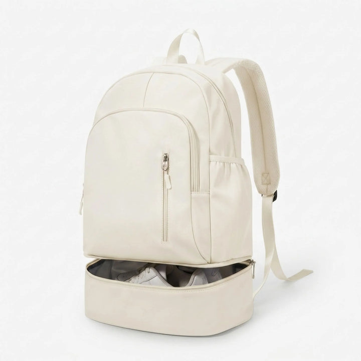 Modern unisex sports backpack for active lifestyles, featuring a convenient shoe compartment and multi-pocket storage.