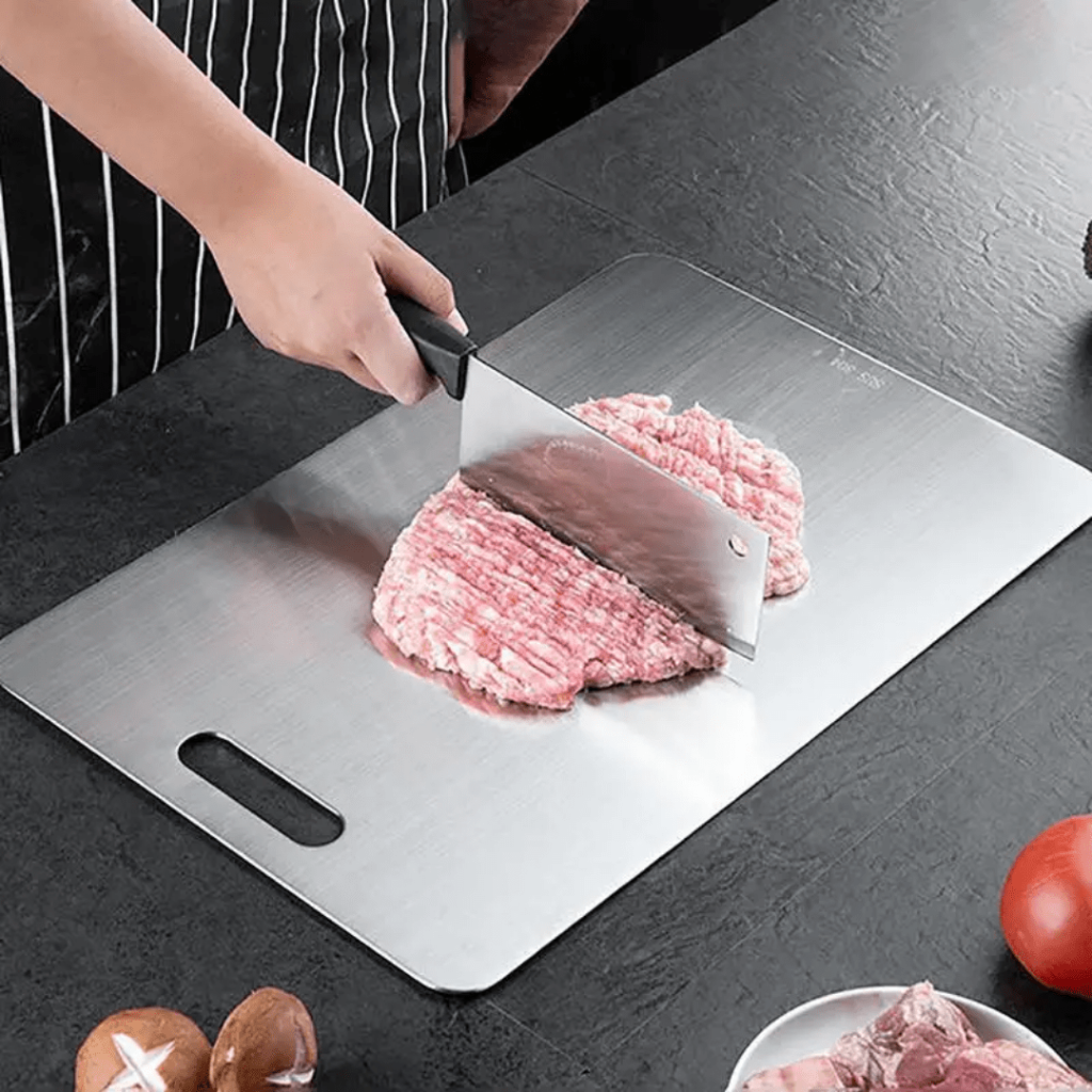 Rustproof stainless steel cutting board. Odor-neutral, durable, and dishwasher-safe kitchen essential for food prep.