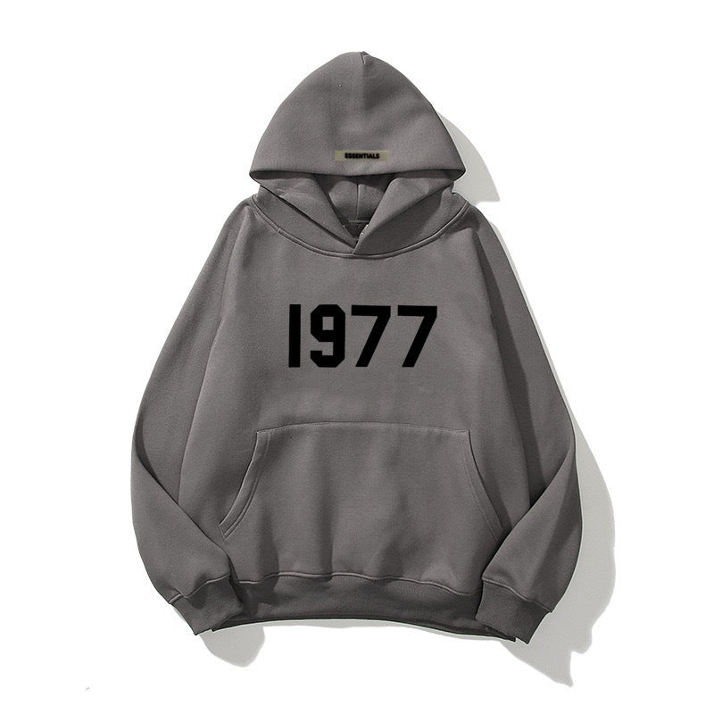 Vintage 1977 print unisex streetwear hoodie, raglan sleeve pullover for authentic retro style.