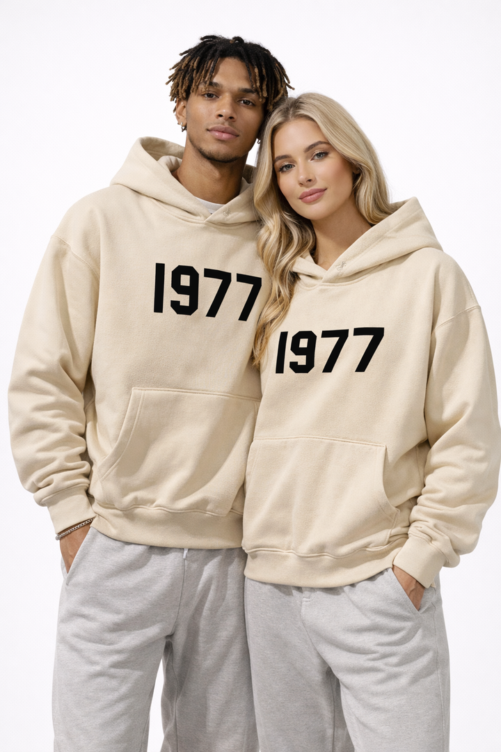 Stylish unisex casual pullover hoodie, raglan sleeves and iconic 1977 print for streetwear.