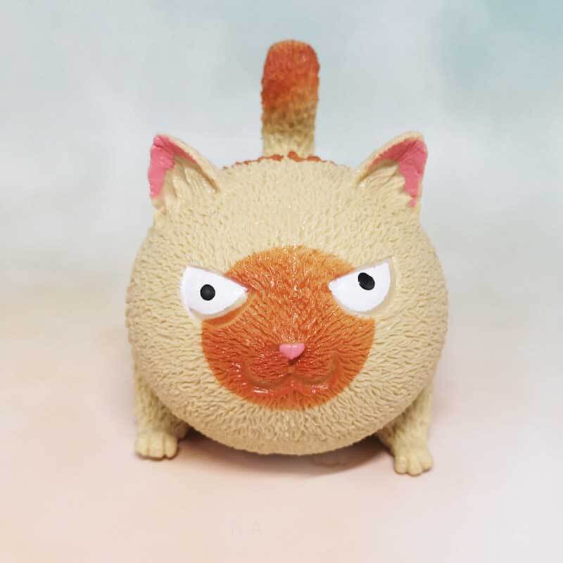 Rebound cat stress relief toy, white, compact plastic design, perfect fidget for office or home