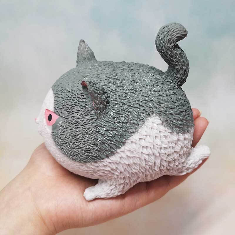 Rebound cat fidget toy, white, soft touch plastic, anxiety relief, perfect novelty office gift