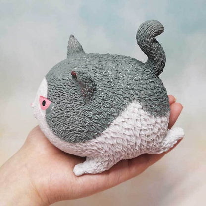 Rebound cat fidget toy, white, soft touch plastic, anxiety relief, perfect novelty office gift