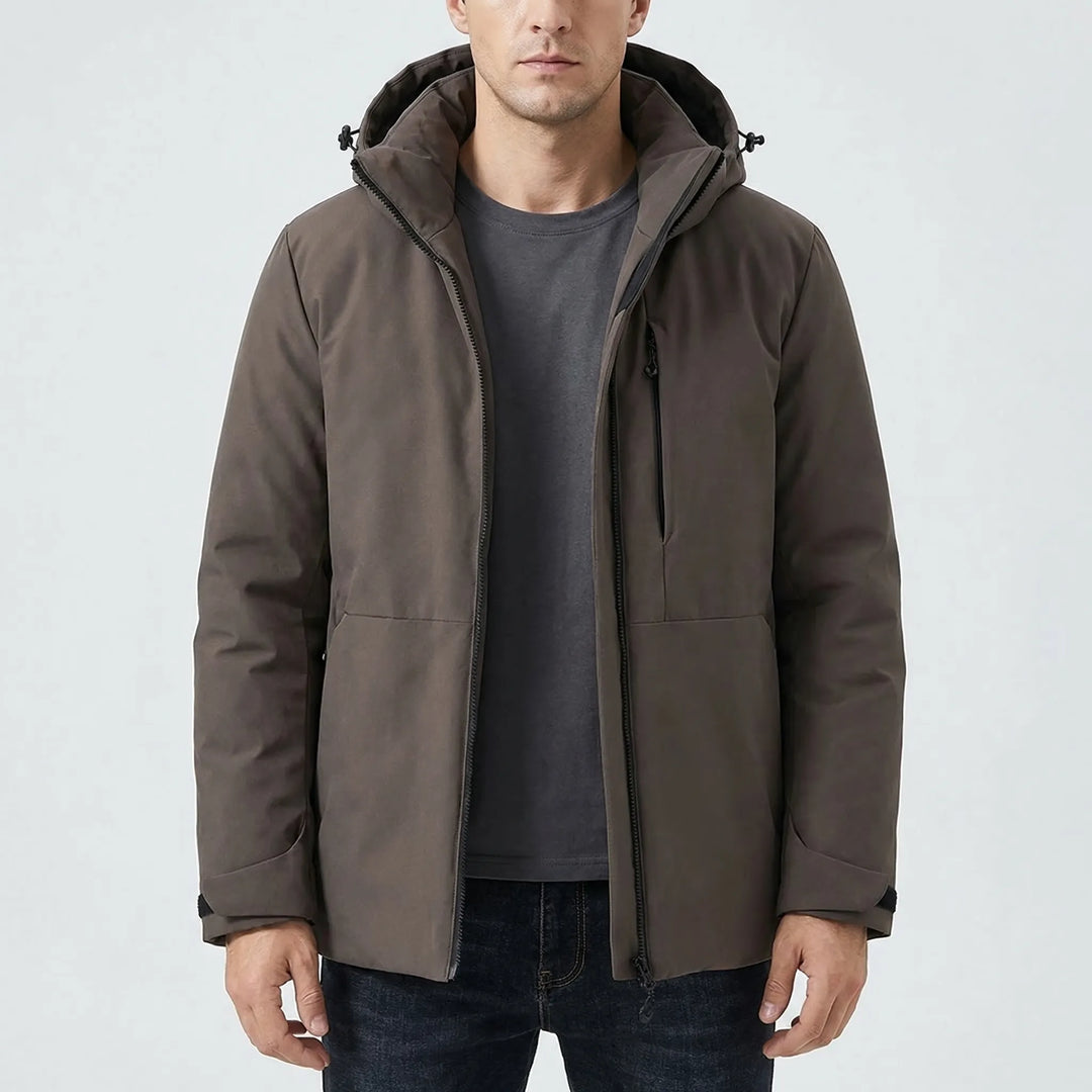 Rain-resistant hooded windbreaker, ideal for hiking, camping, and outdoor adventures in cold weather.