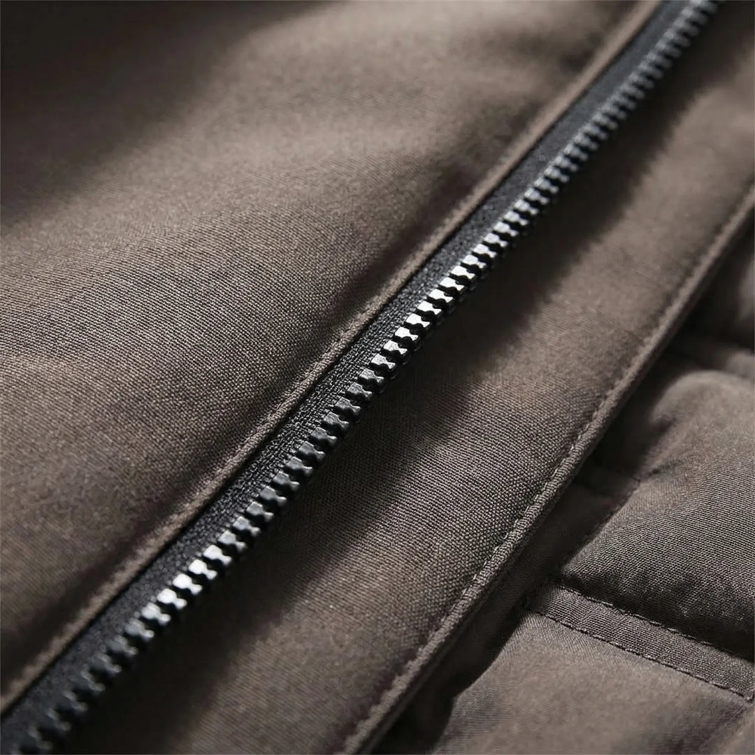 Comfortable hooded thermal jacket, designed for unisex fit & maximum warmth in chilly outdoor conditions.